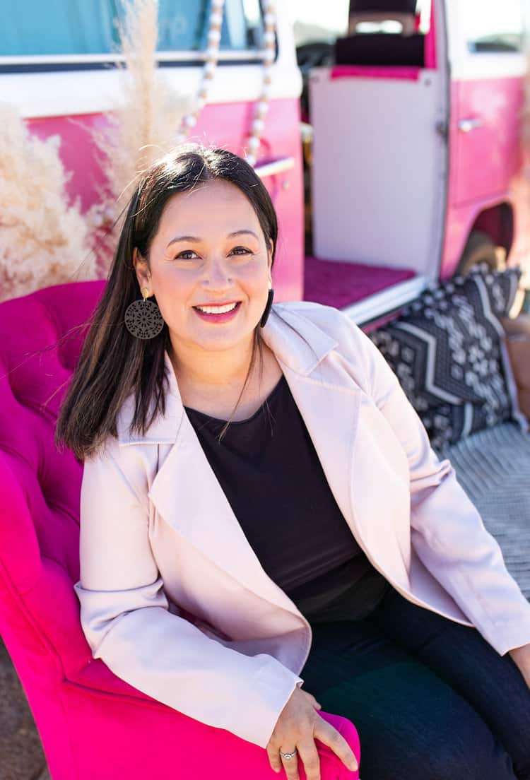 claudia smith sitting on couch